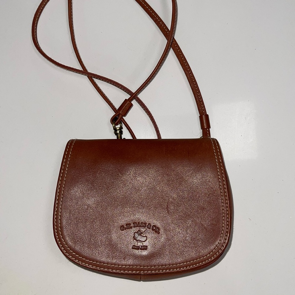 G.H. Bass & Co.  Little leather purse. Crossbody also has belt loops.